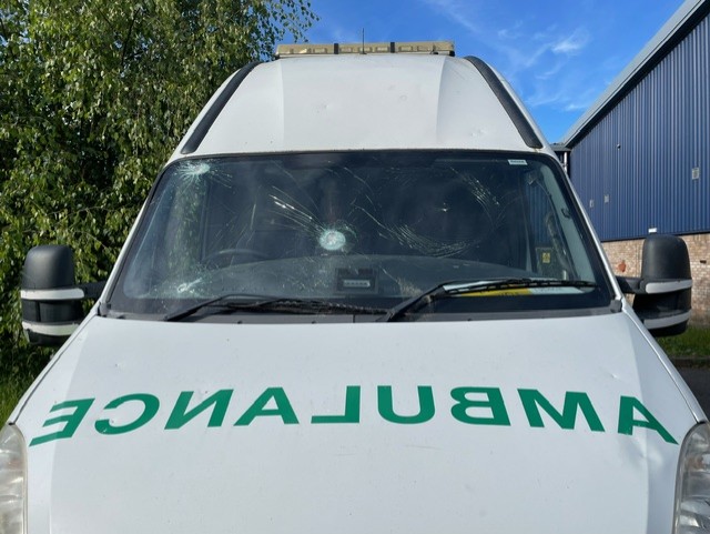 Ambulance with damaged windscreen
