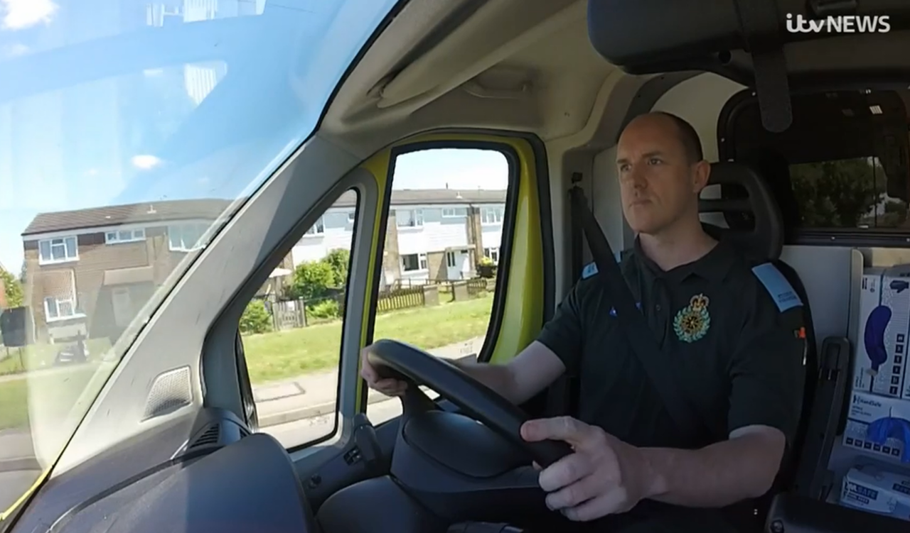 Paramedic driving ambulance