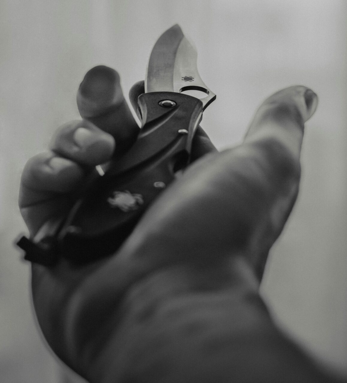 A knife is held in an open palm