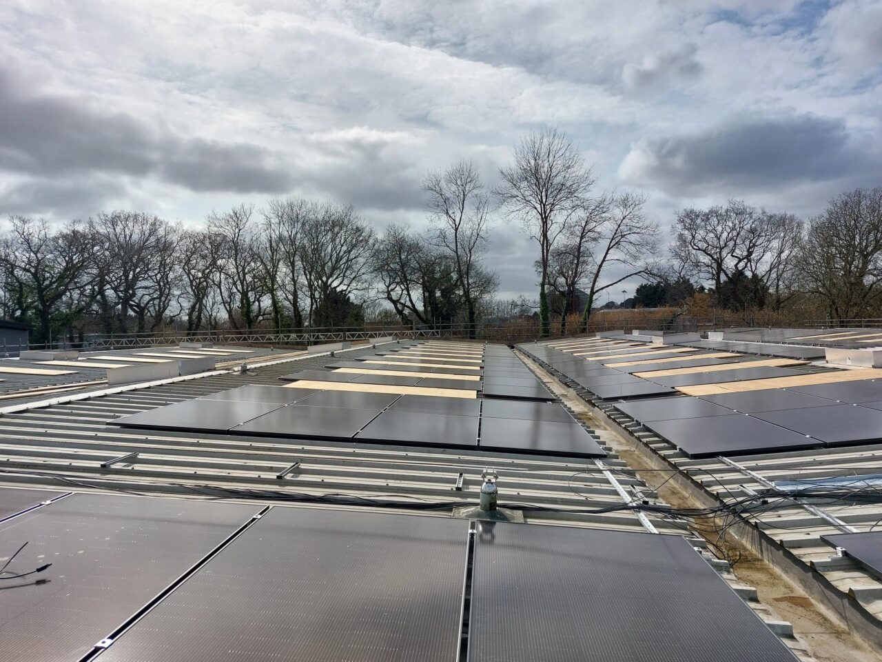 Solar panels being installed on a roof